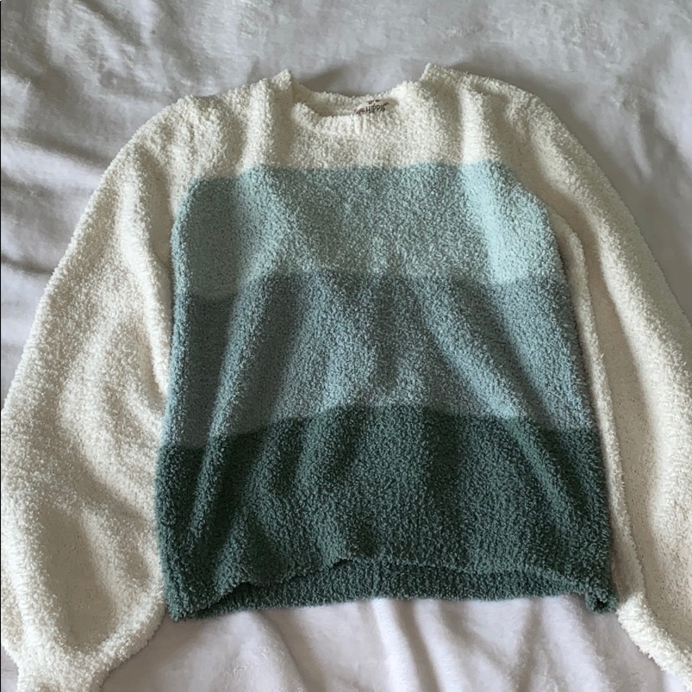 different blue toned sweater